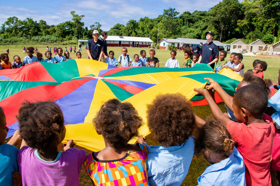 Circle of Joy: Cooperative Parachute Games for Groups
