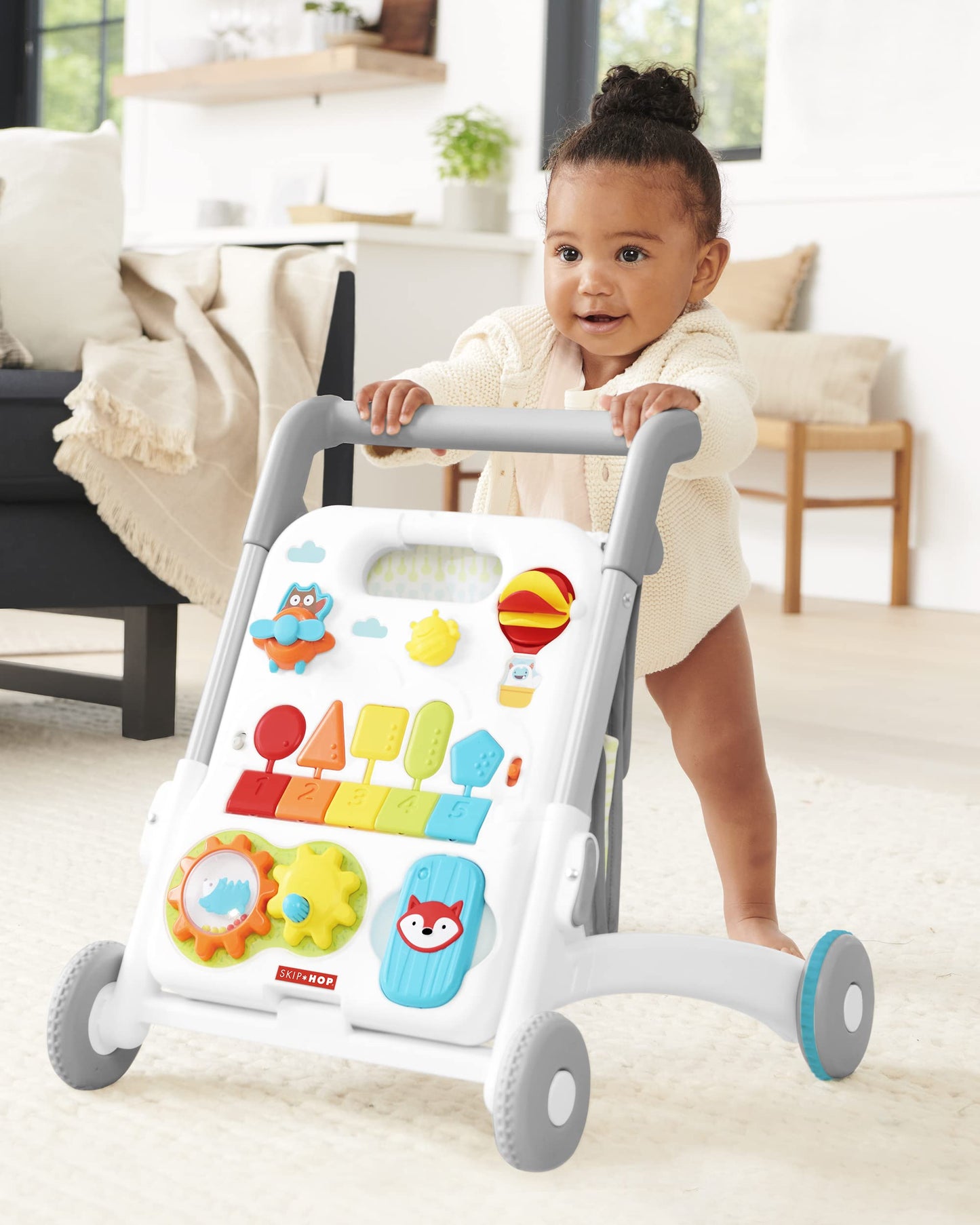 Skip Hop Baby Walker 4-in-1 Sit to Stand Convertible Light Up Walker with 40+ Activities Explore &