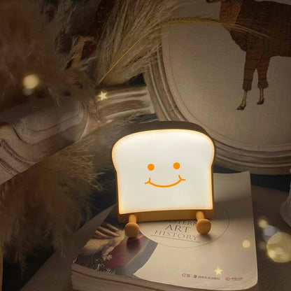QANYI Toast Bread Night Light,Soft LED Toast Lamp with Cute Face Always Smile,Bedroom Table Lamps