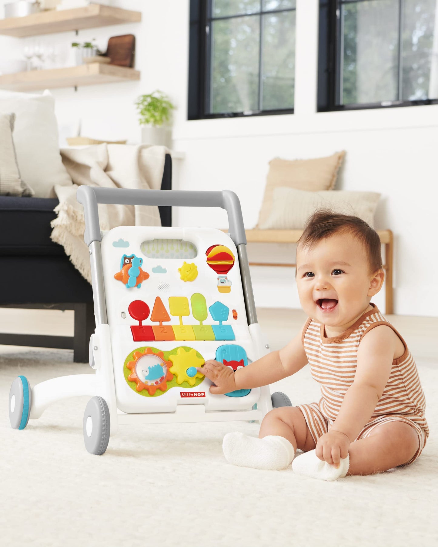 Skip Hop Baby Walker 4-in-1 Sit to Stand Convertible Light Up Walker with 40+ Activities Explore &