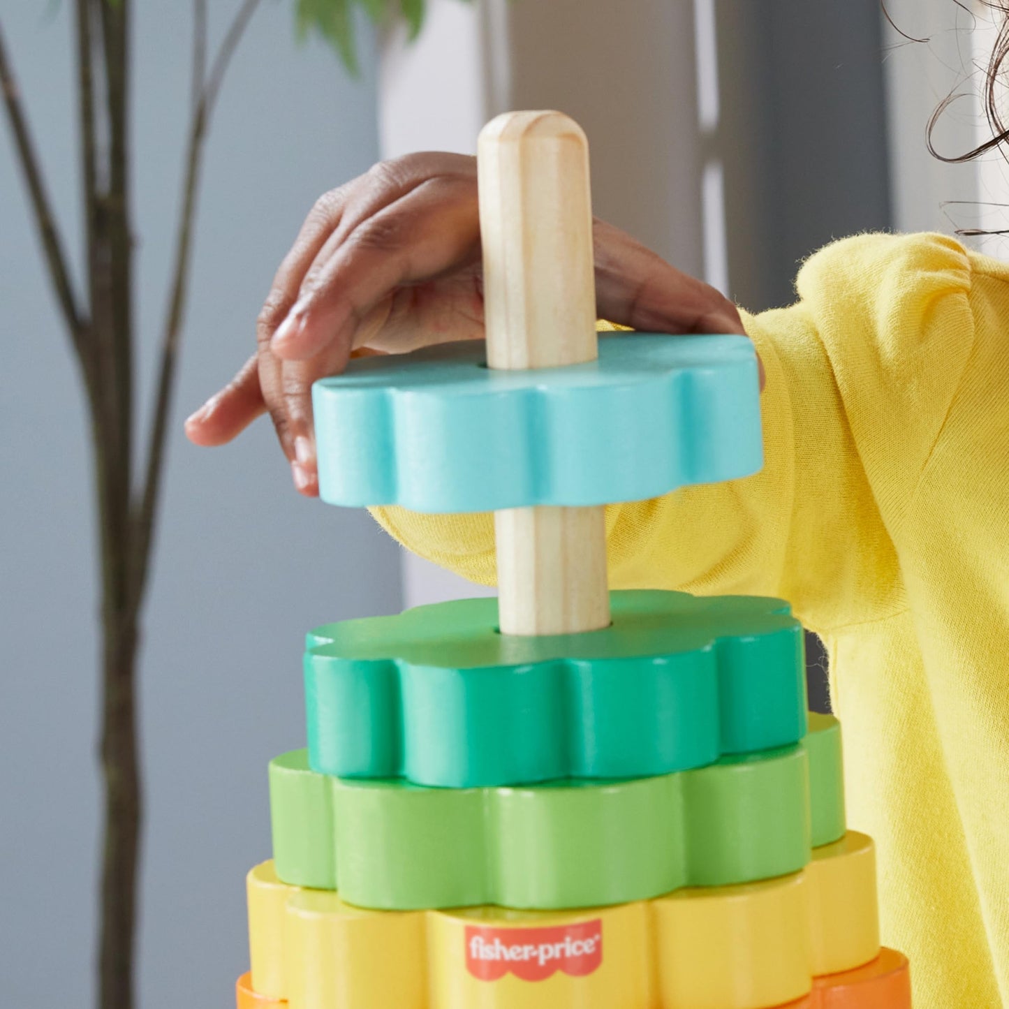 Fisher-Price Wood Toddler Toy Ring Stacker, 10-Piece Wooden Stacking Activity for Fine Motor Skills
