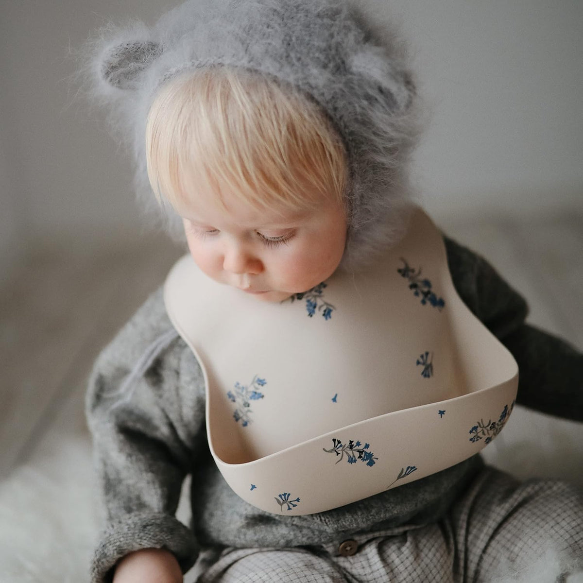 mushie Silicone Baby Bib | Adjustable Fit Waterproof Bibs (Lilac Flowers)